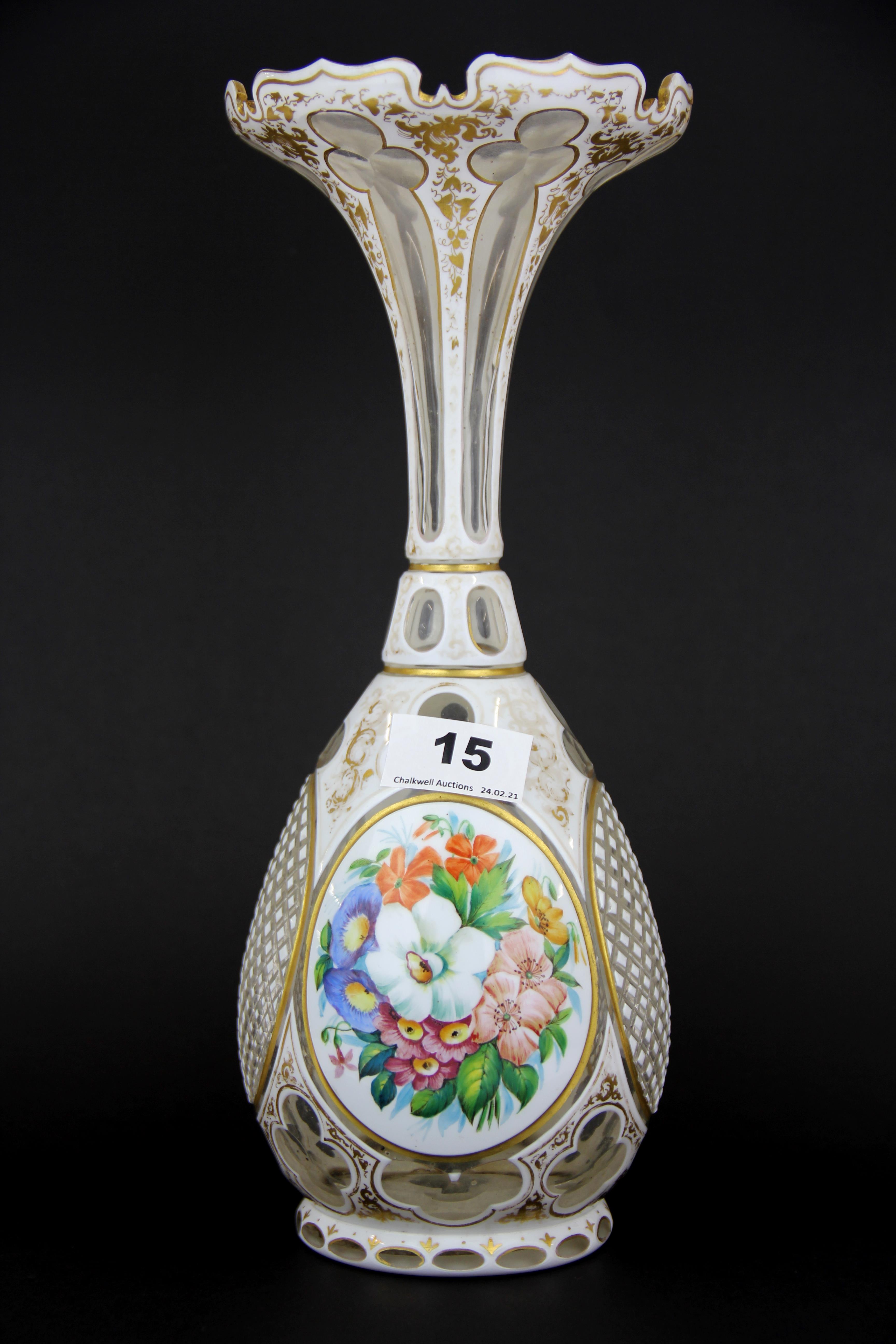 A lovely early 19th century hand painted and gilt Bohemian cut glass vase, H. 31cm, a/f to rim.