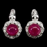 A pair of 925 silver drop earrings set with cabochon cut rubies and white stones, L. 1.5cm.
