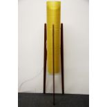 A 1970's teak and fibre glass floor lamp, H. 112cm. A/F to shade.