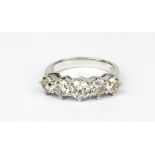 An18ct white gold (stamped 750) ring set with five brilliant cut diamonds, approx. 3.59ct, (N).