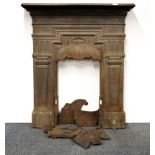 A Victorian cast iron fireplace, mantle W. 89cm.