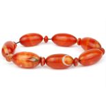 A polished Corneliun bead bracelet.