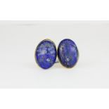 A pair of gilt metal lapis lazuli set cufflinks, L. 2.5cm.