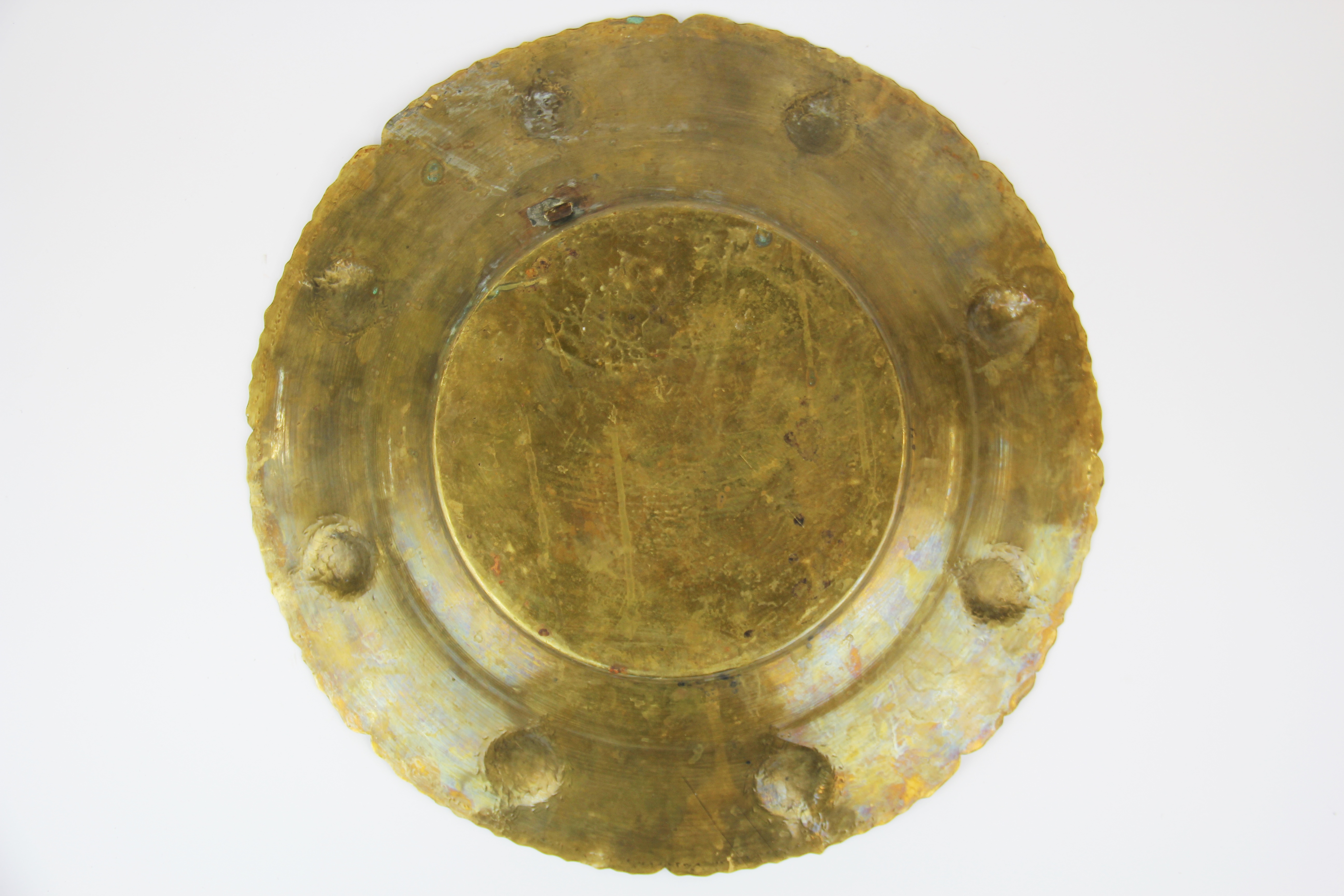 An 18th/19th century hammered brass Mughal charger, Dia. 39.5cm. - Image 3 of 3