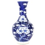 A 19th century Chinese hand painted porcelain vase decorated with prunus pattern, H. 22cm.