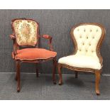 Two upholstered occasional chairs.