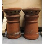 A pair of 1930's terracotta chimney pots, H. 47cm.