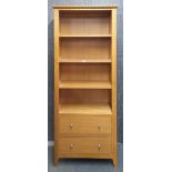 A contemporary bookcase with two drawers, 181cm x 78cm x 30cm.