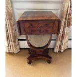 An early 19th C. rosewood veneered work box, 72cm x 42cm x 39cm. Extended 74cm.