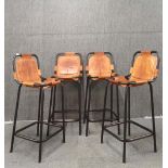 Four contemporary leather upholstered metal framed bar stools, H. 95cm, W. 37cm.