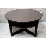 A contemporary dark wood finished circular coffee table, Dia. 90cm. H. 48cm.