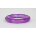 A polished lavender jade bangle, Dia. 9cm.