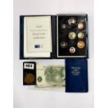 A group of good condition British and foreign bank notes and coins.