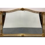 An impressive gilt framed reproduction mirror.