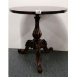 A rosewood veneered Victorian style wine table.