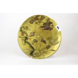 A 19th century Japanese bronze / brass plate overlaid with copper birds and insects, Dia. 37cm.