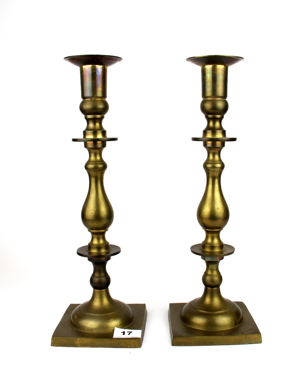 A pair of large brass candlesticks, H. 39cm.