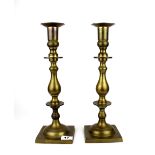 A pair of large brass candlesticks, H. 39cm.