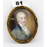 A Georgian gilt framed hand painted miniature portrait of a gentleman, 8 x 7cm.