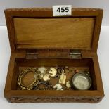 A wooden box and mixed silver and other jewellery contents.