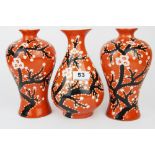 A garniture of three Chinese hand painted porcelain vases. H.21cms. Condition: no visible damage