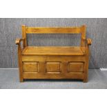 A heavy quality wooden storage bench, W. 103cm. H. 80cm.