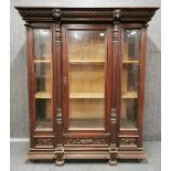 A large 19th century Continental carved mahogany cabinet, H. 265cm, W. 137cm.