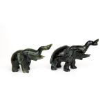 A pair of carved jade/hardstone elephants, 11 x 7cm.