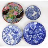 A group of four 19th century Japanese porcelain chargers and plates. Largest D. 32cm. Condition: