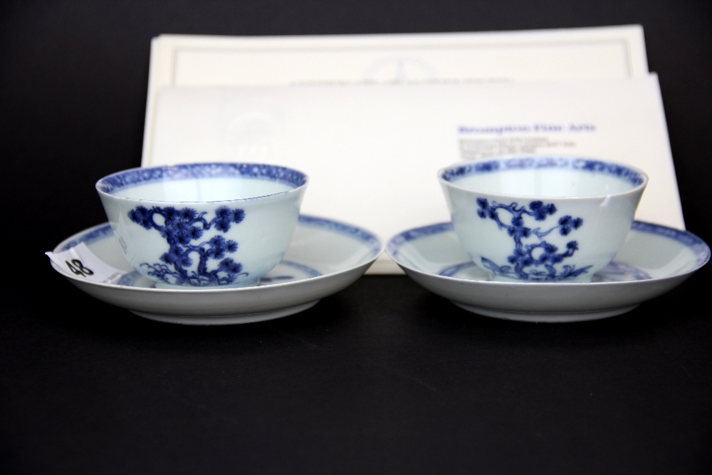 Two 18th century Chinese export porcelain tea bowls and saucers from the Nanking Cargo. Saucer D.