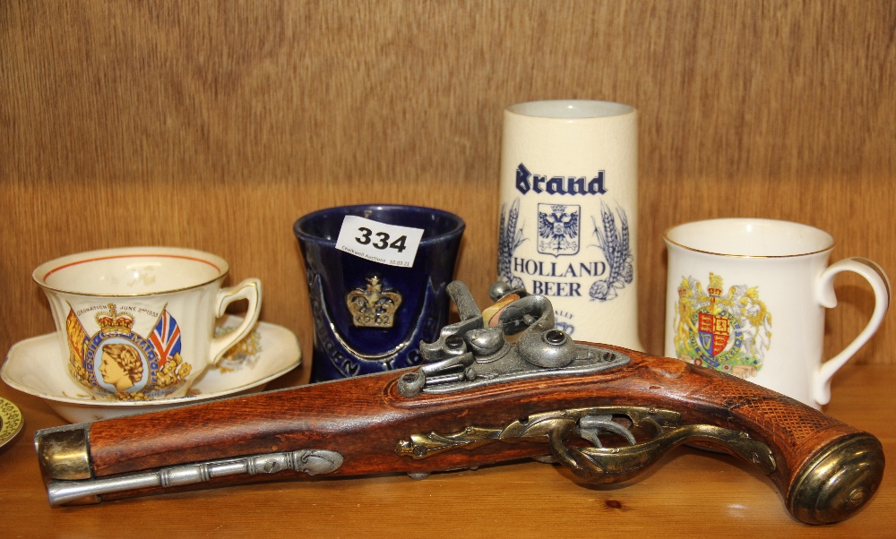 A small trench art brass vase with a Limoges Bayeux tapestry mug, replica flint lock pistol and - Image 2 of 3