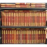 Sixty-three volumes, cloth bound, of Punch Magazine 1893 - 1937.