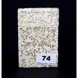 A 19th century finely carved Chinese ivory card case, 11.5 x 7.5cm.