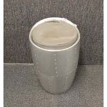 An aluminium covered aviator style stool, H. 51cm, Dia. 40cm.