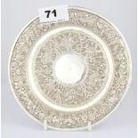 A Persian hammered white metal (tested silver) dish, approx. 153gr, Dia. 16cm.