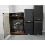 A Pioneer record deck and Hi-Fi system with cabinet and four speakers.