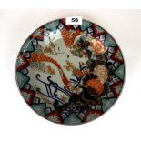 An early Japanese hand painted Imari porcelain dish, probably Edo period. D. 25cm. Condition: no