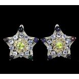 A pair of 925 silver star shaped earrings set with cabochon cut sapphires, tanzanites, citrines