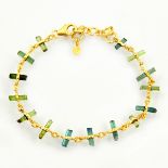 A 925 sivler gilt bracelet set with rough green and blue tourmaliens, L. 18cm.