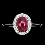 A 925 silver cluster ring set with a cabochon cut ruby and white stones, (S).