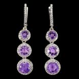 A pair of 925 silver drop earrings set with round cut amethyts and white stones, L. 4.5cm.