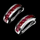 A pair of 925 silver chanel ruby set earrings, L. 1.8cm.