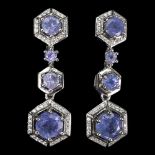 A pair of 925 silver drop earrings set with round cut tanzanites and white stones, L. 3.5cm.