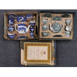 A boxed willow pattern child's tea set together with a further boxed children's tea set.