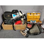 A quantity of old camera and photography related equipment.