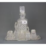 A cut crystal decanter together with a cut crystal cruet, decanter H. 24.5cm.