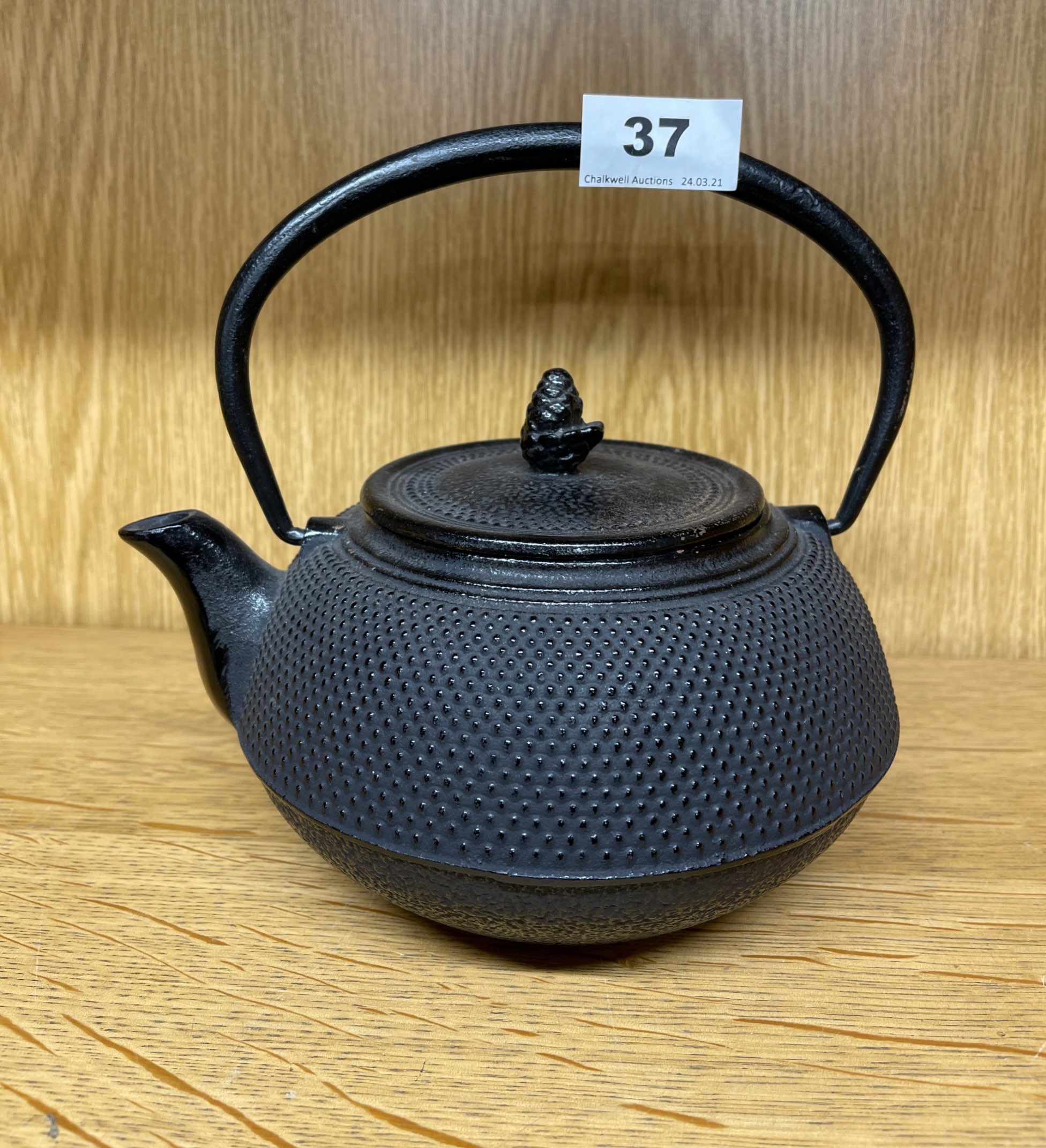 An old Chinese cast iron kettle, H. 20cm.