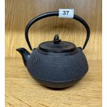 An old Chinese cast iron kettle, H. 20cm.