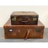 Two vintage leather suitcases, largest 71 x 22 x 25cm.