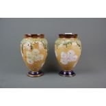 A pair of Royal Doulton glazed stoneware Lambeth Art Union vases, H. 21.5cm.